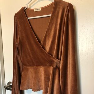 Burt orange top with a fun flare